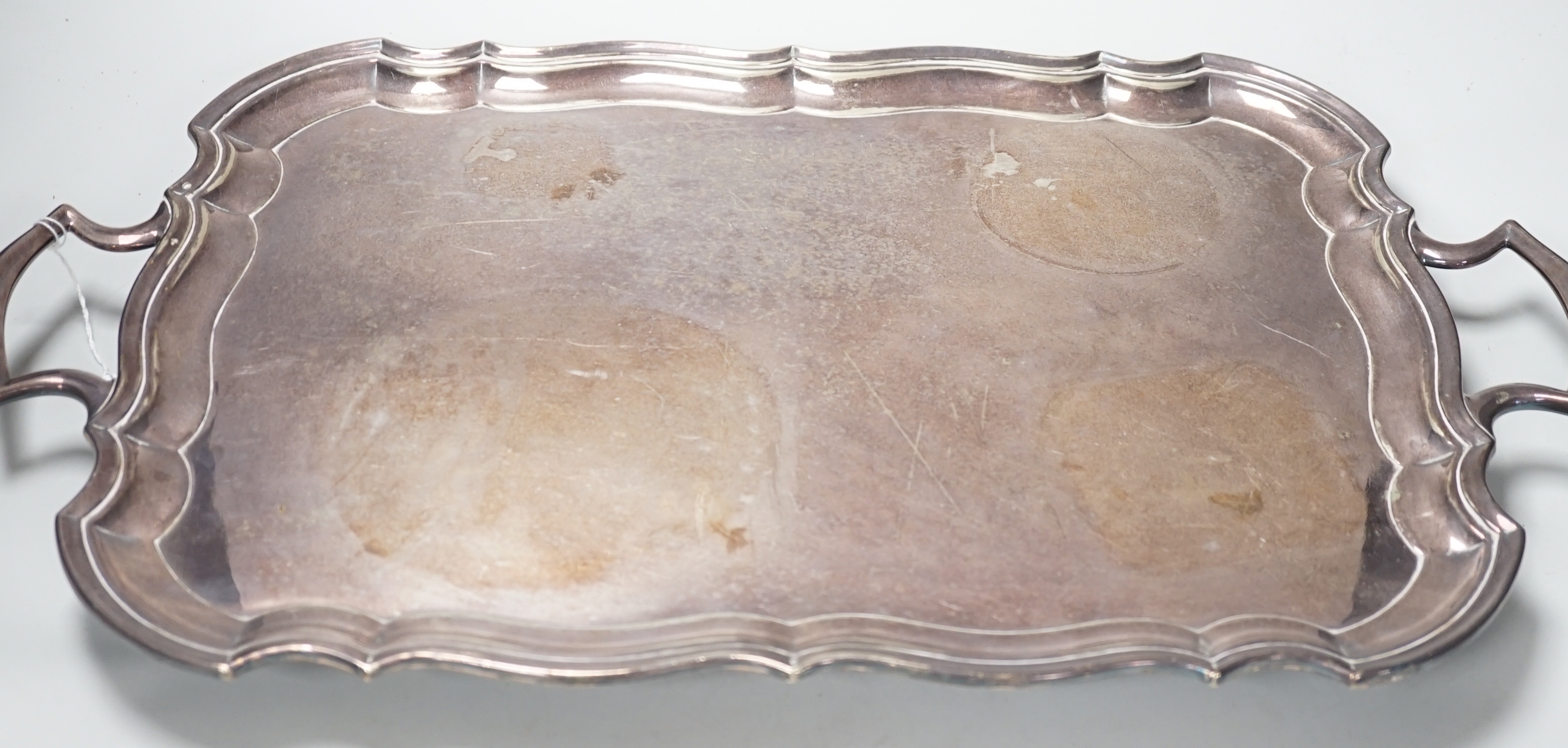 A silver plated two handled tray, 56cm wide